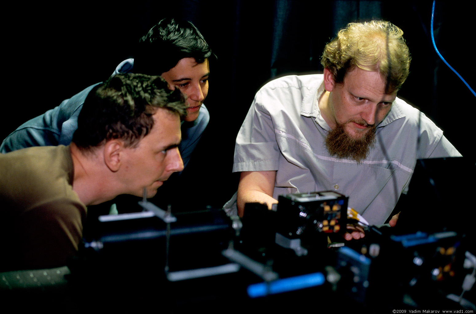 Picture of CQT researchers setting up a quantum cryptography system