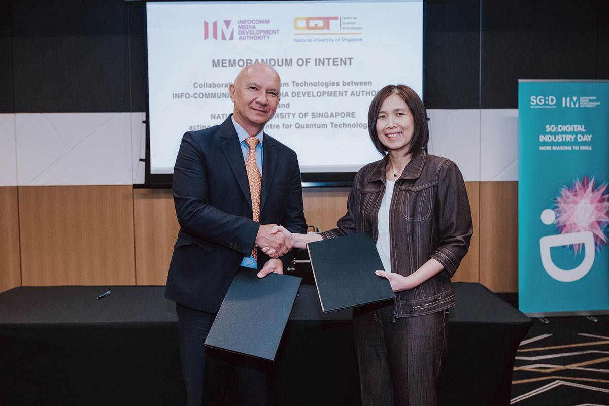 Artur Ekert (left) of CQT and Aileen Chia of IMDA (right) pictured at the signing of a Memorandum of Intent between the organisations.. 
