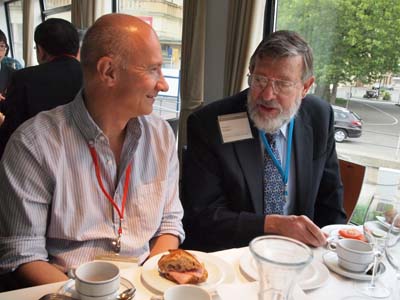 Artur Ekert and Bill Phillips enjoying breakfast at the Lindau Nobel Laureate Meeting.