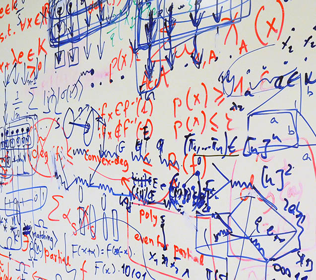 Whiteboard at the Centre for Quantum Technologies in Singapore with many layers of writing